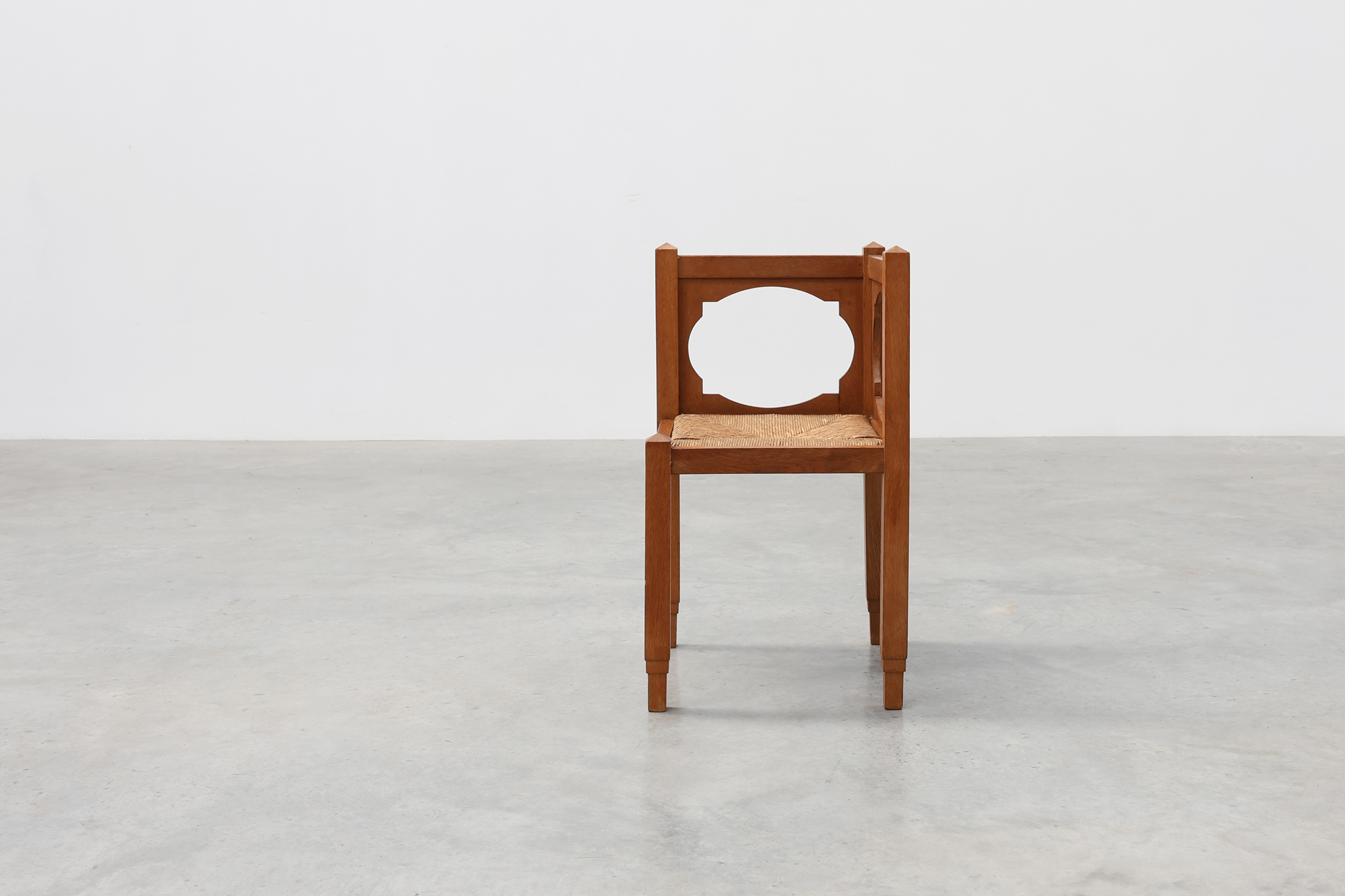 Art Deco Oak Corner Chair with Cut‑Out Backrest and Rush Seat, Belgium, circa 1920thumbnail